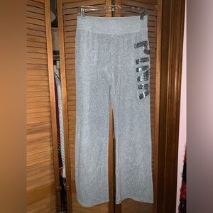 PINK sequined velour pants.